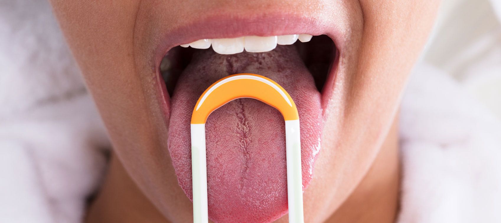 Benefits of Tongue Scraping: A Guide to Better Oral Health - PharmEasy Blog